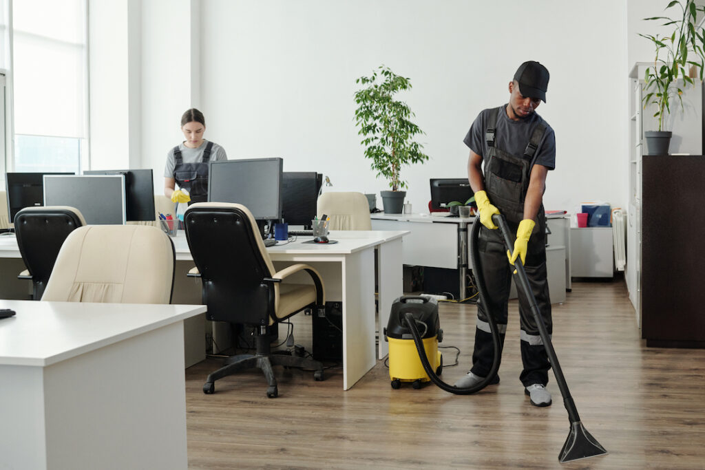people cleaning an office